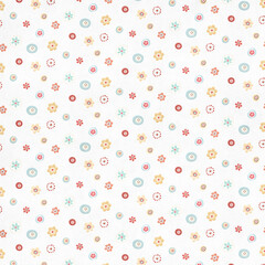 Soft pastel seamless pattern with tiny multicolored floral circles on white, ideal for cute fabric, baby textiles, stationery, and light decorative designs.