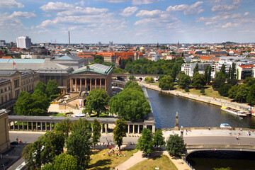Berlin, Germany - July 9, 2024: View of central Berlin from the Berlin Cathedral, with Museum Island, the Spree River, and iconic city landmarks under a clear summer sky.
