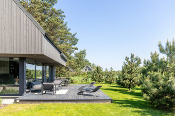 Modern luxury villa exterior in minimal scandinavian style, 3d render © evgenij