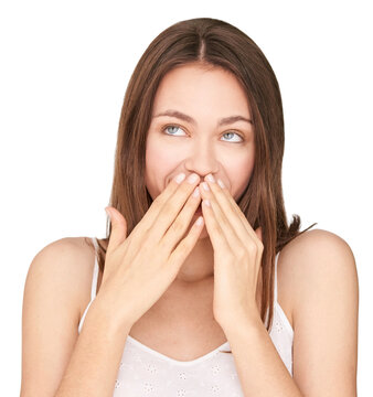 Young caucasian female covering mouth with hands in surprise or laughter