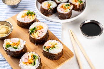 Traditional Korean food kimbap, with ham, vegetables and lettuce