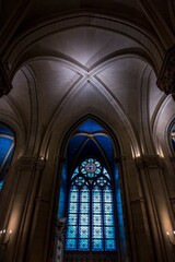 Paris, France - January 2, 2025: Interior of Notre-Dame de Paris cathedral after reconstruction following the fire in 2019. View of the renovated stained glass windows