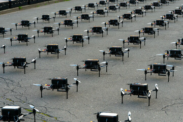 Row of drones arranged symmetrically on the ground, Zagreb, Croatia