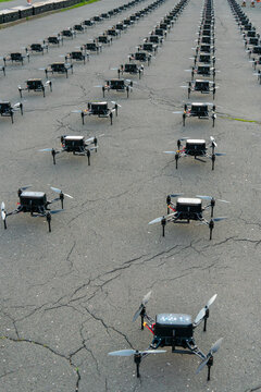 Row of drones arranged symmetrically on the ground, Zagreb, Croatia
