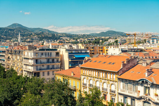 Panoramic view of Nice cityscape with historical architecture under a clear blue sky, Provence, France