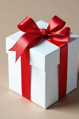 Obraz premium Red gift bow tied neatly on a white cardboard box, gift, newyears, ribbon