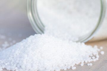 Urea granules (carbamide, CO(NH2)2) - nitrogenous mineral fertilizer.