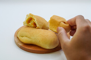 bread on a wooden cutting board. isolated background