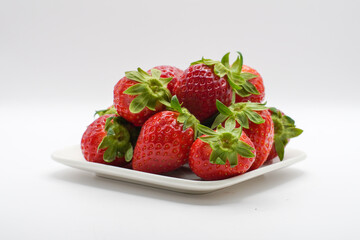 Red strawberry in a bowl