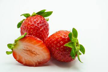 Fresh strawberries, a delicious and healthy fruit, perfect for snacks or desserts on a white background