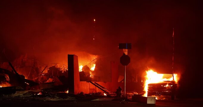 Altadena, California, USA - January 8, 2025: Aided by extreme Santa Ana Winds, the Eaton Fire destroys downtown Altadena.