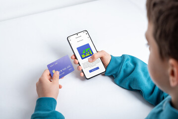 Boy purchasing a mobile game on a smartphone, illustrating the concept of digital payments for apps and gaming content