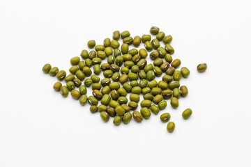 Flat lay (top view) of Mung bean (Vigna radiata) seeds isolated on white background.