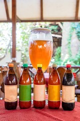 View on glass beer tower with bottles at the pub