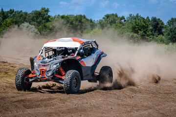 UTV buggy, rally or 4x4 in the action on sand