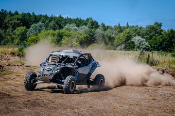 UTV buggy, rally or 4x4 in the action on sand