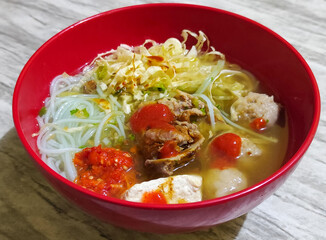 Bakso. Bakso is a very popular food in Indonesia, can be served with tofu and beef bones. Bakso is made from minced beef or chicken mixed with tapioca flour, garlic, and other ingredients.