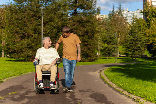 Caring interaction between a man and user with cerebral palsy