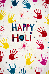 Fototapeta premium Joyful Holi Festival Wall Decoration with Colorful Handprints and Bold Message