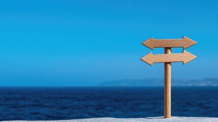 Wooden signpost with arrows pointing in opposite directions by sea