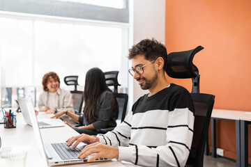 Collaborative office environment showcasing teamwork and focus