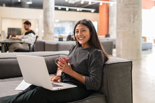 Teamwork Collaboration in a Modern Office Workspace Setting