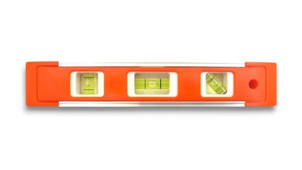 Top view of an orange spirit level with three bubble vials for measuring horizontal, vertical, and...