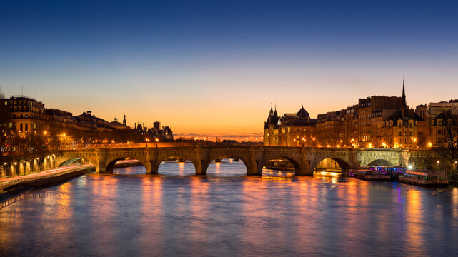 Paris Sunrise with the Pont Neuf and Ile de la Cit&eacute;. The Seine River banks are a Unesco World Heritage site. France