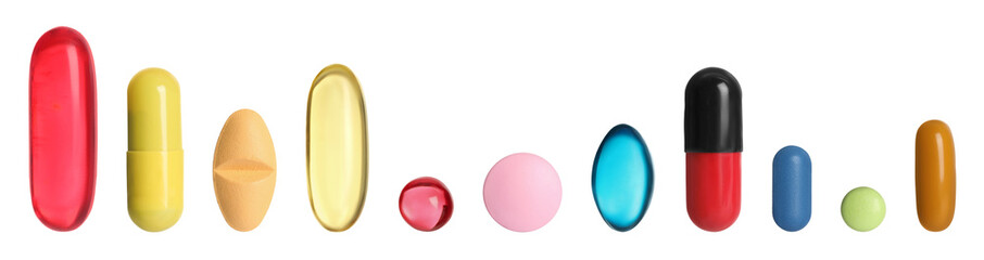 Different pills in row isolated on white, set