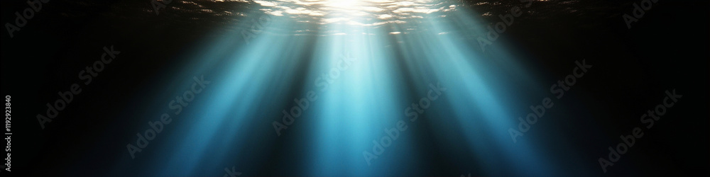 Poster underwater light rays shining through the ocean surface creating a serene and tranquil atmosphere