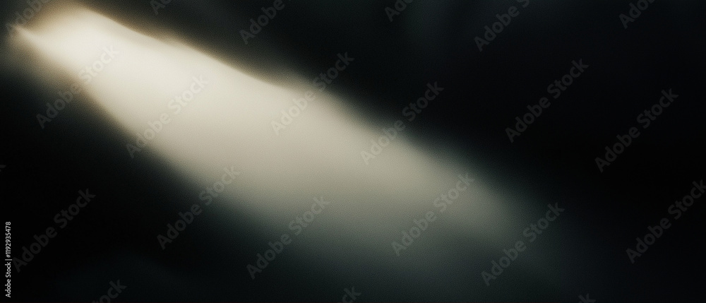 Poster light beam illuminating a dark environment with soft glow and subtle shadows