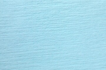 Blue paper background, abstract colored background, top view and flat lay
