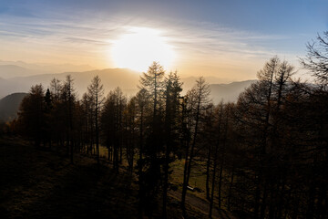 Obraz premium The top of the Austrian mountain Gerlitzen in the Carinthian Alps in autumn at sunset with a view of the forest