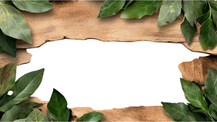 Fototapeta premium Wooden frame surrounded by green leaves with a blank center for text.