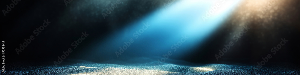 Poster light beams over particles creating a mesmerizing glow in a dark setting