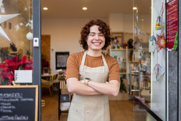 Young Shop Assistant Smiling Outside an Organic Products Store