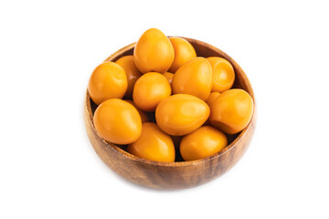 Pile of Smoked Quail eggs isolated on white, side view