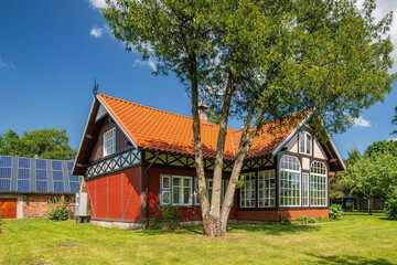 Fototapeta premium typical european village house, summer background