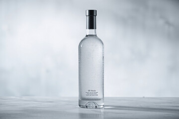 Vodka bottle mockup with a sleek design on an elegant background, ideal for branding showcase