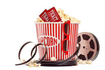 Tasty popcorn, film reel, glasses and movie tickets isolated on white