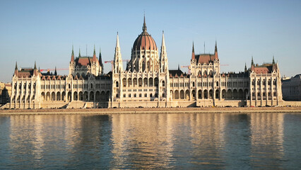 Naklejka premium Hungary's Parliament building in Budapest by the Danube river