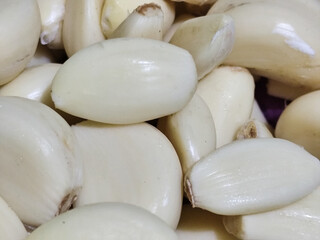 Peeled garlic. Garlic is a cooking spice ingredient.