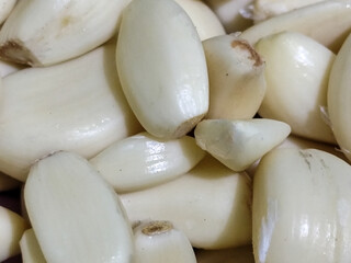 Peeled garlic. Garlic is a cooking spice ingredient.