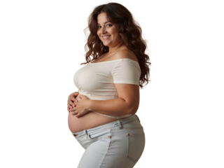 Expecting mother joyfully poses in light clothing showcasing her baby bump in a studio setting