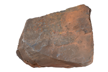 A rock specimen with a distinctive layered surface on a transparent background. Close up.