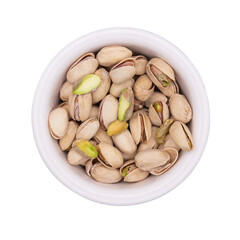 Top view of a bowl full of pistachios isolated on a cut out PNG transparent background