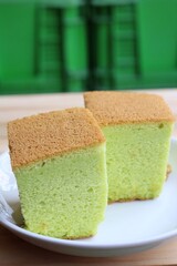 Sponge cake on wood background