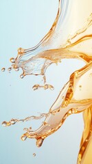 Obraz premium Golden liquid splashing and forming elegant shapes