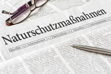 Zeitung mit der &Uuml;berschrift Naturschutzma&szlig;nahmen