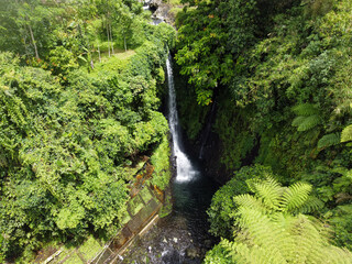 Fototapeta premium The drone view of Pete Waterfall in Banyumas Regency, Central Java, Indonesia. It was taken on January 13, 2025 by a professional. It's a wonderful landscape with a nice view